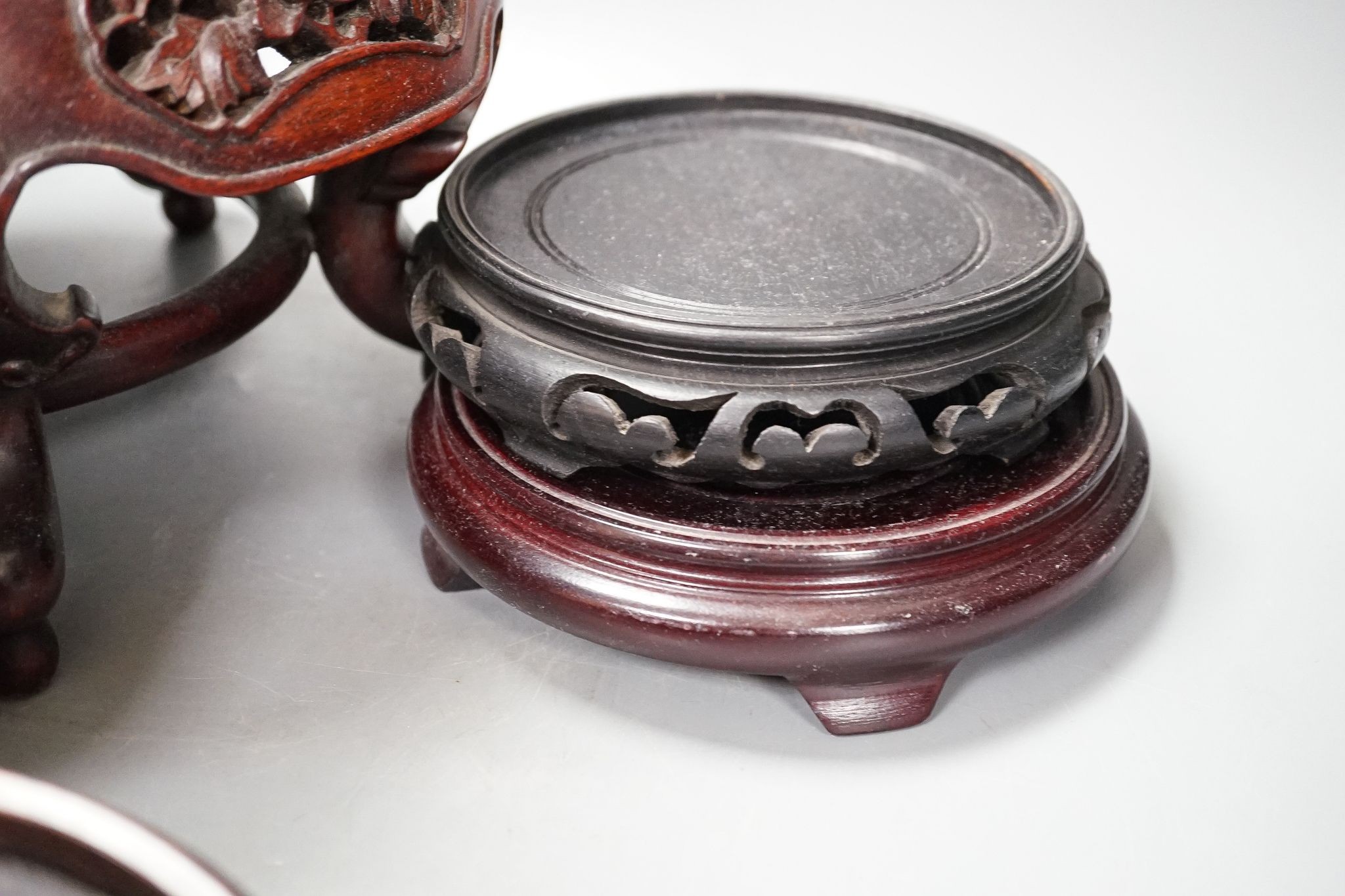 A group of Chinese hardwood stands, 19th/20th century, one marble inset, latter 19cm high